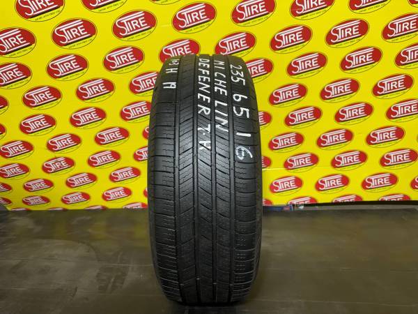 235/65R16 103H Michelin Defender T+H Used Single All Season Tire 235/65R16 Michelin Defender T+H Used Single All Season Tire - Image 1